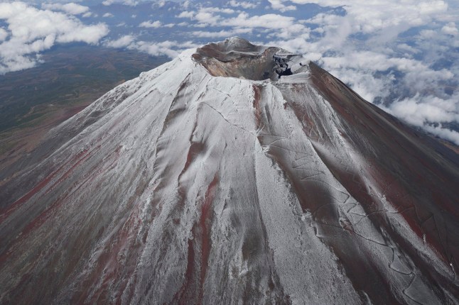 Mt. Fuji in Japan is covered with snow Wednesday, Nov. 6, 2024. (Kyodo News via AP)