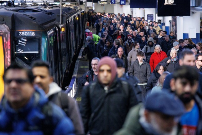 Passengers on a busy platform at London Euston station in January 2025.