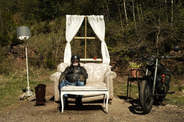 An art project centered around an abandoned sofa in Lydbrook, Gloucestershire. A dumped sofa in the middle of a village has become an unexpected tourist attraction - with hundreds taking photos at the spot. The two-seater settee was dumped on a waste ground in the middle of Lydbrook, Gloucestershire, at the start of April. But local photographer Alex Elton-Wall found potential in the sofa and its location - and has now taken the portraits of more than 150 nearby residents at the popular site. The abandoned sofa even has its own listing on TripAdvisor and a Facebook page titled Lydbrook Lounge with visitors posting photographs of themselves.