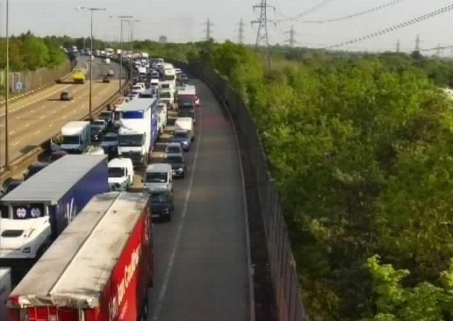 Traffic has been held on the M25 anti-clockwise between J11 #Ottershaw & J10 #Wisley following a collision involving a motorbike.