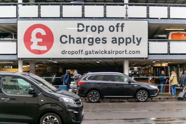Drop off charge sign outside car park at Gatwick Airport.