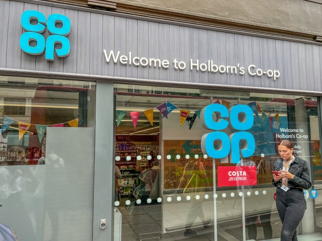 London, UK-July 21, 2022: The retail shop of co-op in Holbom, London. The Co-operative Group, trading as the Co-op, is a British consumer co-operative with a diverse family of retail businesses including food retail and wholesale; e-pharmacy; insurance services; legal services and funeral care.