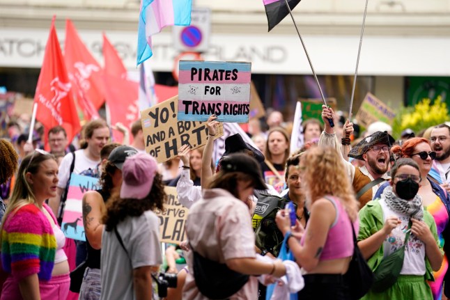 People take part in a Trans Pride protest march in Brighton. Picture date: Saturday July 20, 2024. PA Photo. See PA story PROTEST Pride. Photo credit should read: Andrew Matthews/PA Wire