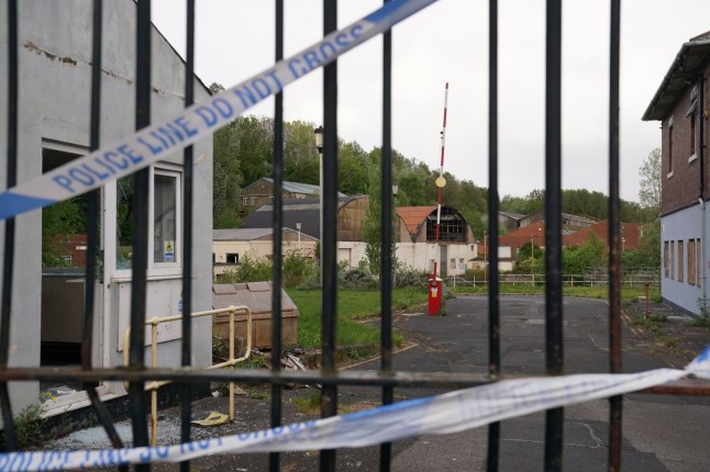 Police tape on the gates of Fairfield Industrial Park in the Bill Quay area of Gateshead where a body believed to be that of 14-year-old Layton Carr was located deceased inside a building following a fire.