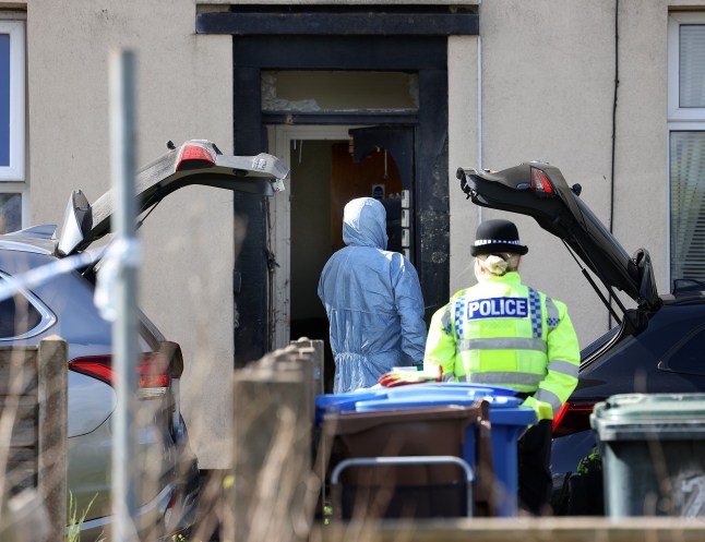 Police scene on East St in Rochdale following a counter terrorism raid . 4 May 2025