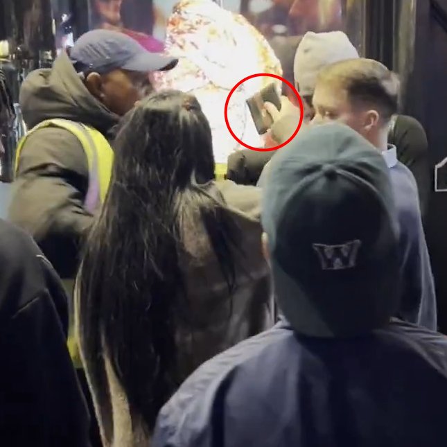 Story from Jam Press (Crowd Chant Thief) Pictured: Video grab - The woman retrieved her wallet, which had been stolen by the thief who was caught. VIDEO: 'W*nker, w*nker!? Crowd chant football fan-style at ?phone thief? after he?s 'caught' A crowd of people chanted ?w*nker, w*nker? football fan-style at an alleged would-be phone thief after he was stopped in the street. The suspected crook was apprehended and the mob crowded around him. The balaclava-clad man was grabbed by members of the public after he allegedly attempted to steal a mobile. Security staff in the area helped to hold the suspect as the aggravated crowd voiced its opinion. The group could be heard chanting ?w*nker? repeatedly at the suspected thief. Some members of the public could be heard telling people to ?Take his bally off.? One girl also retrieved a wallet, as reported by NeedToKnow. Eventually, the alleged thief?s beanie and balaclava were ripped from his head. The man, in an all black outfit, was eventually let go and was seen walking away sheepishly from the jeering crowd. The bizarre interaction took place on Wardour Street, Soho, central London, on Saturday (3 May). Members of the public were left shocked by the situation. Joey Gold said, ?Just love how he?s being treated like a player coming back to his former club and getting booked for a nasty tackle.? Leilani Dowding added: ?Why did they let him go? ?Yeah, shouting ?w*nker? will do the trick. Same leniency as the courts.? Hamzah Kamal said, ?These men chanted at him?? Angela Bell added: ?Good news. ?Hopefully, this will deter other thieves and make the streets a little safer.? Billy said, ?This needs to happen more often.? The Met Police has been approached for comment. ENDS EDITOR'S NOTE:??Jam Press advises obscuring the thief's face shown in the videos before publication. Grabs from the video have been provided with blurring. Video Usage Licence: (NON-EXCLUSIVE) We have obtained a non-exclusive licence from the copyright holder. A copy of the licence is available on request. Video Restrictions: None.