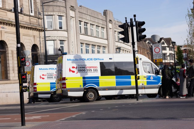 Two police vans at the top of St Peters Street in Derby as Parts of Derby City Centre have been cordoned off after a man was stabbed in a Lloyds Bank bank in St Peter???s Street in Derby City Centre. (Photo by Ben Booth/EEm/Sipa USA)