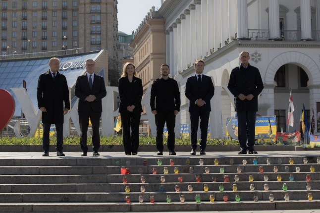 (From L) Poland's Prime Minister Donald Tusk, Britain's Prime Minister Keir Starmer, Olena Zelenska, Ukraine's President Volodymyr Zelensky, France's President Emmanuel Macron and Germany's Chancellor Friedrich Merz pose for a picture at the Independence Square (Maidan) in Kyiv on May 10, 2025, ahead of a gathering of European leaders in the Ukranian capital. The leaders of Britain, France, Germany and Poland make an unprecedented joint visit to Kyiv on May 10, 2025 for talks with Ukraine's President Volodymyr and to urge Russia to agree a ceasefire, a joint statement said. (Photo by Roman PILIPEY / AFP) (Photo by ROMAN PILIPEY/AFP via Getty Images)