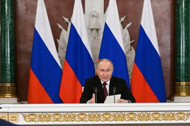 Russian President Vladimir Putin gestures as he speaks to journalists in the Grand Palace at the Kremlin in Moscow, Russia, Sunday, May 11, 2025, after celebrations of the 80th anniversary of the Soviet Union's victory over Nazi Germany during World War II. (Sergei Bobylev/Photo host agency RIA Novosti via AP)