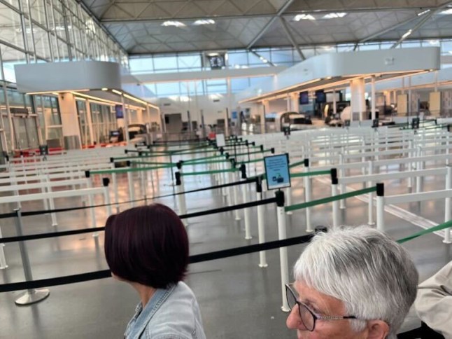 Anne Alexander @Annemariealex Stansted Airport right now. IT system issue, the airport says . Some people are queuing outside just to get inside the airport terminal. Some have given up and gone home as they have missed their flights. These pics are taken from the queue towards departures and security .