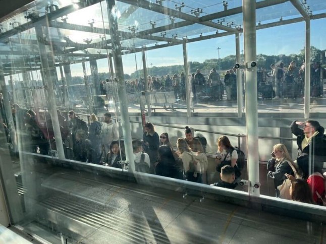 Anne Alexander @Annemariealex Stansted Airport right now. IT system issue, the airport says . Some people are queuing outside just to get inside the airport terminal. Some have given up and gone home as they have missed their flights. These pics are taken from the queue towards departures and security .