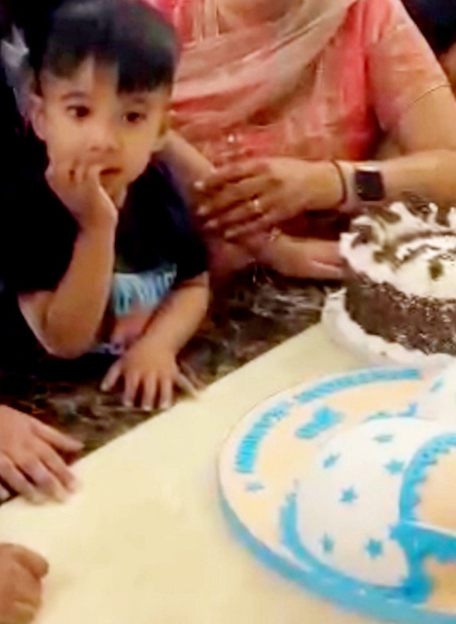 Genie Kaur's son Kamron with the cake. When a mum posted photos of a novelty cake ordered to mark the day her son would stop being breastfed, the iced design ??? a pair of boobs in a bra ??? sparked so much controversy she has hit back at critics. Genie Kaur from Barton Seagrave had decided that she would tell her son Kamron that his third birthday would mark the day he would no longer be breastfed. As a visual metaphor the boob cake would be cut to signify the break from the breast, but on the day the little boy was so sad that the plan was scrapped. When a picture of the fabulous busty Victoria sponge wearing a blue starry bikini ordered from The Cake Story in Kettering was shared on her social media, Genie was surprised to have the cake called ???inappropriate???.