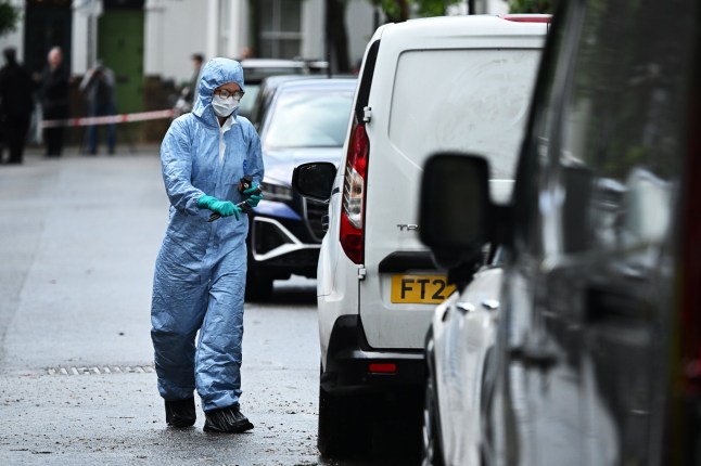 LONDON, ENGLAND - MAY 12: Police forensics officer seen near the home of UK Prime Minister Sir Keir Starmer on May 12, 2025 in London, England. An investigation is underway after a fire broke out in the early hours of Monday morning at a property owned by Prime Minister Keir Starmer in north London. The doorway to the home was damaged, but no injuries were reported. Starmer and his family currently reside at the prime minister's official residence at Downing Street in central London. (Photo by Leon Neal/Getty Images)