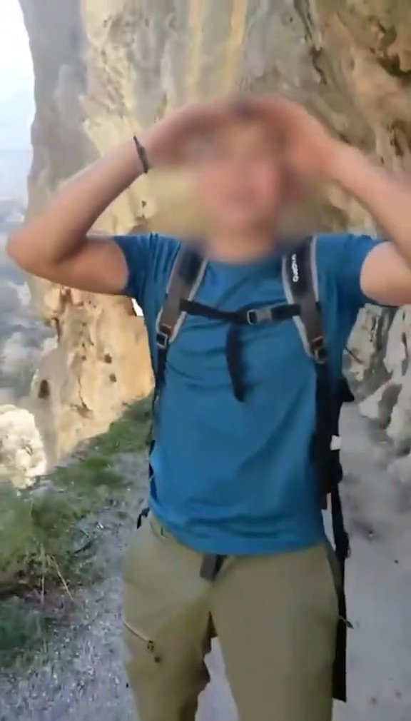 Story from Jam Press (Idiot Throws Rock) Pictured: Video grab - The young man?s pal filmed him casting the heavy rock and the video was later uploaded to social media for ?likes?. VIDEO: Idiot tourist faces ?168,000 fine for throwing huge rock down gorge in popular park An idiot tourist is facing an eye-watering ?168,000 fine for throwing a massive rock down a gorge in a popular national park. The young man?s pal filmed him casting the heavy rock and the video was later uploaded to social media for ?likes?. Seconds after the large stone was tossed, a deafening bang was heard as it hit the ground several metres below. The idiotic stunt was filmed at a point along the popular Cares Trail in northern Spain?s Picos de Europa National Park. Of the park?s estimated 2m annual visitors, around 300,000 hike the Cares Trail - its most popular walking route. The clip was later shared by a social media account that features videos of young people throwing rocks into voids. Although most clips on the page get a handful of views, this one blew up and quickly caught the police?s attention. The Spanish Civil Guard have since announced that they are investigating the young man?s antics, as reported by NeedToKnow. A spokesperson said: ?This stunt could cost you dearly. ?Throwing this rock could land this person with a fine ranging from ?5,001 to ?200,000. ?Why? Because disturbing the environment in the Picos de Europa National Park is classed as a very serious offence. ?Keep that in mind when visiting a national park - these are specially protected areas due to their high environmental value.? Javier said: ?There are livestock farmers who pass through down there. Your little joke could?ve ended badly.? Another viewer said: ?You have to be a real idiot - you could?ve gone down with the rock. The force and weight of that boulder could?ve smashed someone to pieces.? A third said: ?There?s an alternative path underneath - I just hope no one was down there. And let?s not forget, people go canyoning or climbing in those areas - when you throw something, there could be someone below.? A fourth said: ?He should be accompanied by a responsible adult - it?s clear he?s not ready to be out on his own.? And a fifth said: ?In the mountains, you mustn?t throw rocks if you can?t see where they?ll land - you have no idea who might be below. You could hit a person or an animal.? ENDS EDITOR?S NOTES: Quotations have been translated to English. Video Usage Licence:(EMERGENCY SERVICES) We have obtained this material directly from the emergency services (fire / police / ambulance / rescue workers). Video Restrictions: None.