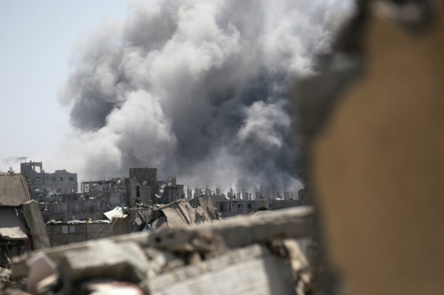 Smoke rises from the site of an Israeli strike in eastern Jabalia