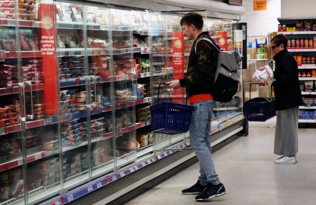 People shopping in a supermarket.