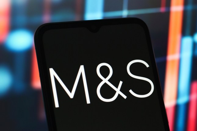 Mandatory Credit: Photo by Thomas Fuller/SOPA Images/Shutterstock (15313931b) In this photo illustration, the Marks and Spencer (M&S) logo is seen displayed on a smartphone screen. Photo illustration in Canada - 21 May 2025