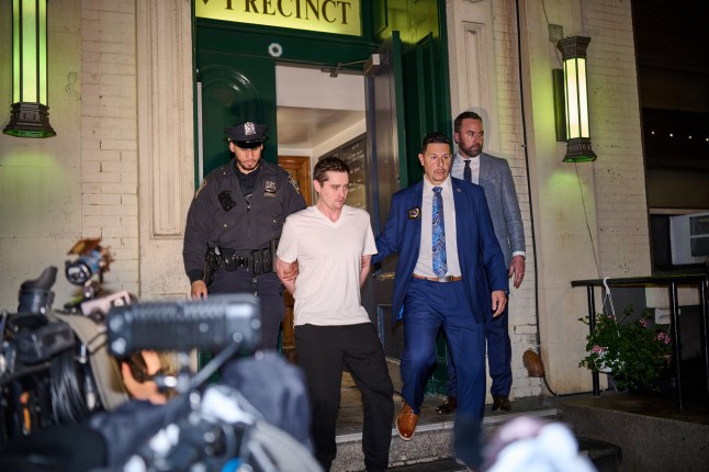 14745663 Inside SoHo apartment of horrors where sadistic man 'tortured tourist with chainsaw for WEEKS to get his crypto passwords' John Woeltz, 37, of Kentucky, is walked out of the 5th precnct after he was arrested for holding an Italian tourist hostage whom he had had a falling out with and torturing him for 2 weeks as he tried to steal his cryto fortune. The tourist managed to escape the townhouse at 38 Prince street in SOHO and flag down a cop who then effected the arrest.