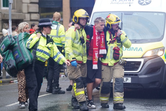 Police and emergency personnel dealing with a road traffic accident on Water Street near the Liver Building in Liverpool after a car collided with pedestrians during the Premier League winners parade. A man has been detained. Picture date: Monday May 26, 2025. PA Photo. See PA story POLICE Liverpool. Photo credit should read: Owen Humphreys/PA Wire