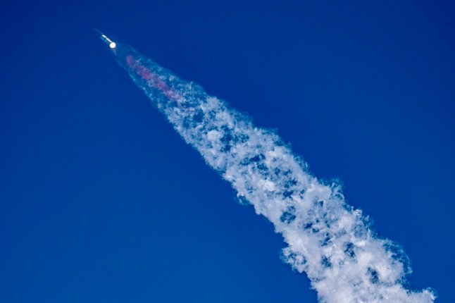The SpaceX Starship rocket launches from Starbase, Texas, as seen from South Padre Island on May 27, 2025. SpaceX mission control lost contact with the upper stage of Starship as it leaked fuel, spun out of control, and made an uncontrolled reentry after flying halfway around the world, likely disintegrating over the Indian Ocean, officials said. (Photo by Sergio FLORES / AFP) (Photo by SERGIO FLORES/AFP via Getty Images) *** BESTPIX ***