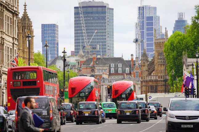 Vehicles in central London on the road.