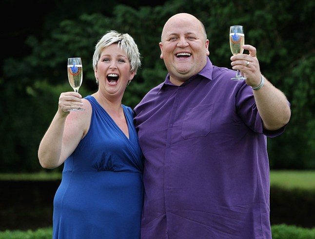 Adrian Bayford, 41, and wife Gillian, 40, from Haverhill, Suffolk, after a press conference at Down Hall Country House Hotel in Hatfield Heath, Hertfordshire, after they won ?148.6 million on Friday's EuroMillions jackpot. PRESS ASSOCIATION Photo. Picture date: Tuesday August 14, 2012. The staggering sum - of ?148,656,000 - is just behind the ?161 million landed by Colin and Chris Weir, from Largs in North Ayrshire, last July. See PA story LOTTERY EuroMillions. Photo credit should read: Sean Dempsey/PA Wire