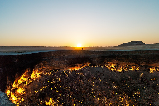 Sunrise at Darvaza gas crater in Turmenistan