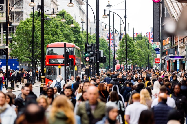Crowds of people on Oxford Street in London, UK
