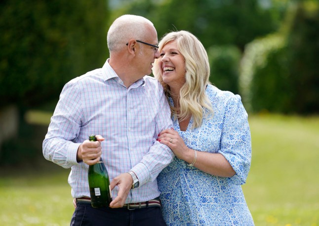Joe Thwaite, 49, and Jess Thwaite, 46, from Gloucestershire celebrate after winning the record-breaking EuroMillions jackpot of ?184M from the draw on Tuesday 10 May, 2022, at the Ellenborough Park Hotel, in Cheltenham, Gloucestershire. Picture date: Thursday May 19, 2022. PA Photo. See PA story LOTTERY EuroMillions . Photo credit should read: Andrew Matthews/PA Wire