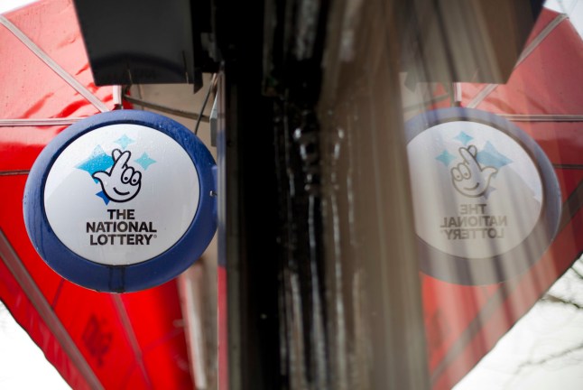 File photo dated 06/01/16 of a National Lottery sign outside a newsagent in north London. The incoming operator of the National Lottery has admitted plans for new draw-based games have been delayed until 2025 after its handover has been hampered by legal wrangling. Issue date: Friday January 26, 2024. PA Photo. Allwyn's recently-appointed UK boss Andria Vidler told the PA news agency that the group will not be able to make any of the bigger changes it had pledged to introduce until next year. See PA story CITY NationalLottery. Photo credit should read: Yui Mok/PA Wire
