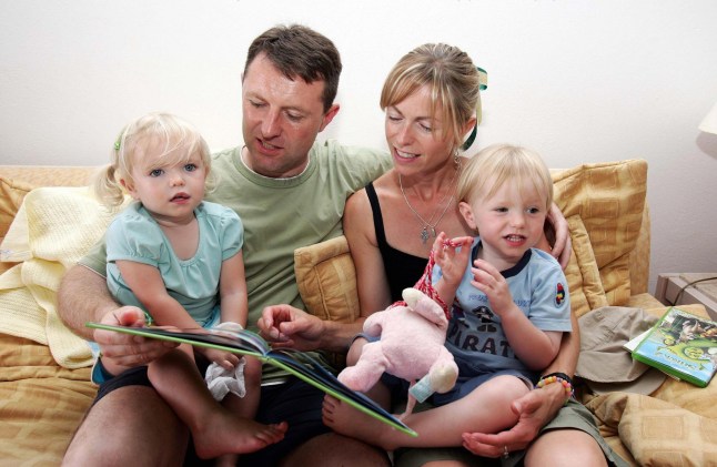 PRAIA DA LUZ, PORTUGAL: British Gerry and Kate McCann are seen with their children Sean and Amelie in their appartment in Praia da Luz in Portugal 19 May 2007. Madeleine McCann, 4, vanished from a resort in Praia da Luz two weeks ago after her parents left her, and her brother and sister both aged two, alone while they went to a nearby restaurant. Police continue to search for her. AFP PHOTO / POOL / Alban Donohoe (Photo credit should read Alban Donohoe/AFP via Getty Images)