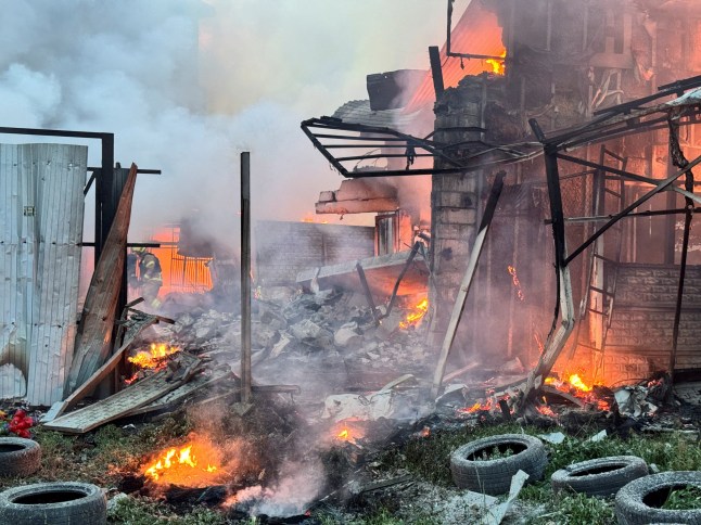 Firefighters work at the site of the Russian drone strike, amid Russia's attack on Ukraine, in Kharkiv, Ukraine June 4, 2025. REUTERS/Vitalii Hnidyi