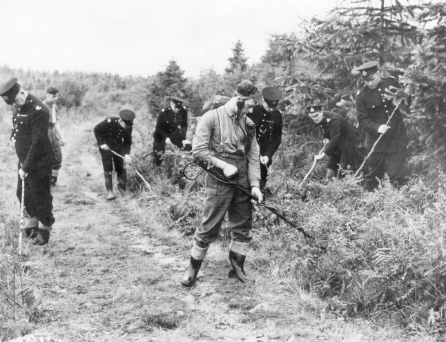 Muriel Drinkwater Murder. Police and Sappers searching the area for clues. 2nd July 1946. (Photo by Daily Mirror/Mirrorpix/Mirrorpix via Getty Images)