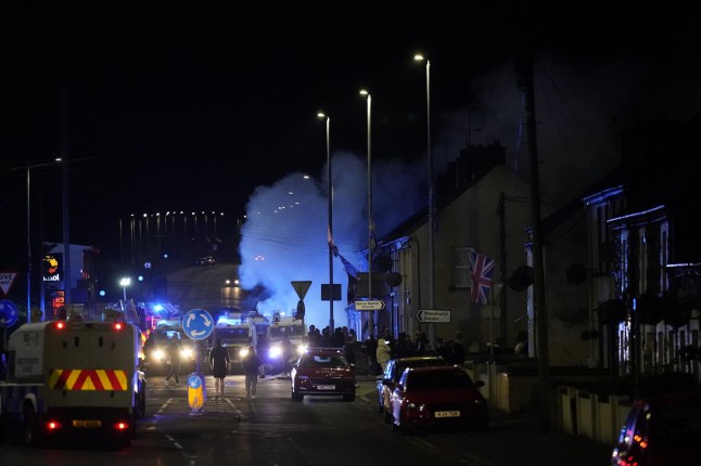 A fire in Ballymena, as people take part in a protest over an alleged sexual assault in the Co Antrim town. Police used water cannon to disperse protesters engaged in serious disorder for a second night in Ballymena, as fireworks and masonry were thrown at officers. Picture date: Tuesday June 10, 2025. PA Photo. See PA story ULSTER Ballymena. Photo credit should read: Niall Carson/PA Wire