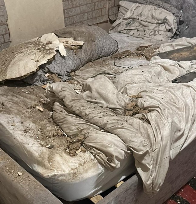 w8media . A disabled man (Sanjay pictured at his flat) whose ceiling has collapsed four times in his home over the last 12 years. There is still a water leak in the home as well as mould and damp at the property in the east end of London Please see story for more info. 10/06/2025.
