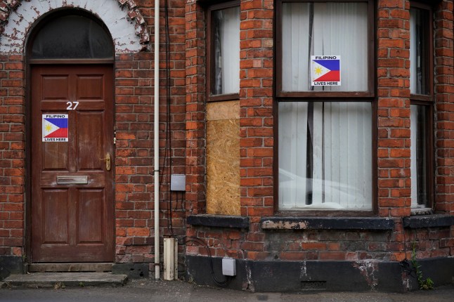 A boarded-up window on a property damaged in a second night of violence in Ballymena, during a protest over an alleged sexual assault in the Co Antrim town. Multiple cars and properties were set on fire in Ballymena while rioters hurled petrol bombs, fireworks and masonry at police officers. Picture date: Wednesday June 11, 2025. PA Photo. Photo credit should read: Niall Carson/PA Wire