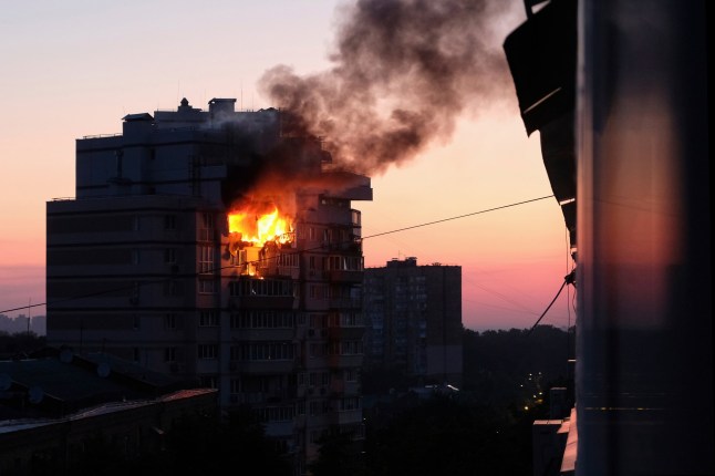 An apartment at multi-storey residential building is seen on fire after a Russian drone strike in Kyiv, Ukraine, on Tuesday, June 17, 2025. (AP Photo)