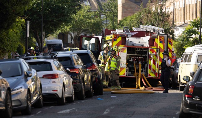 17/06/35 Pictured: emergency response, police and fire service at the scene of gas explosion in Stoke Newton today Caption: Authorities are investigating the cause of a suspected gas explosion at a home in north-east London. Six fire engines and 40 firefighters were called to the scene on Dumont Road in Stoke Newington shortly before 5am on Tuesday.