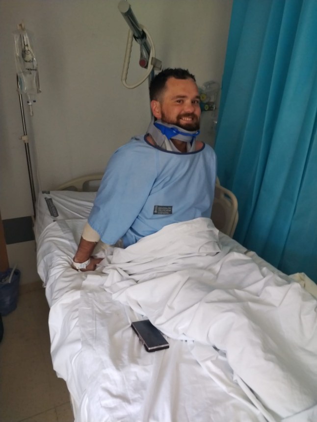 PIC FROM KENNEDY NEWS AND MEDIA (PICTURED: MARTIN BULLEN, 31, IN HOSPITAL AFTER BREAKING HIS NECK ON HOLIDAY IN BENIDORM) A lad's holiday to Benidorm ended in horror when a dad broke his NECK and back - after being 'PUSHED into a shallow pool as a joke'. Martin Bullen was at a Benidorm pool party on 10 June when he claims somebody who he 'didn't know' playfully pushed him into the water. The dad-of-two said he had no idea how shallow the water was so when he was pushed, he tried to dive in but split his head open on the bottom of the pool. DISCLAIMER: While Kennedy News and Media uses its best endeavours to establish the copyright and authenticity of all pictures supplied, it accepts no liability for any damage, loss or legal action caused by the use of images supplied and the publication of images is solely at your discretion. SEE KENNEDY NEWS COPY - 0161 697 4266