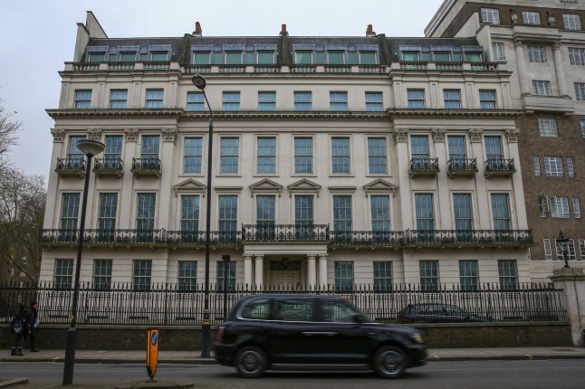 A London taxi passes the mansion at 2-8a Rutland Gate, that sold for more than 200 million pounds ($262 million), in London, U.K., on Saturday, Jan. 25, 2020. The private family office of Cheung Chung Kiu has agreed to buy the 45-room palatial home, overlooking Hyde Park, a spokesman said in an emailed statement. Photographer: Hollie Adams/Bloomberg via Getty Images
