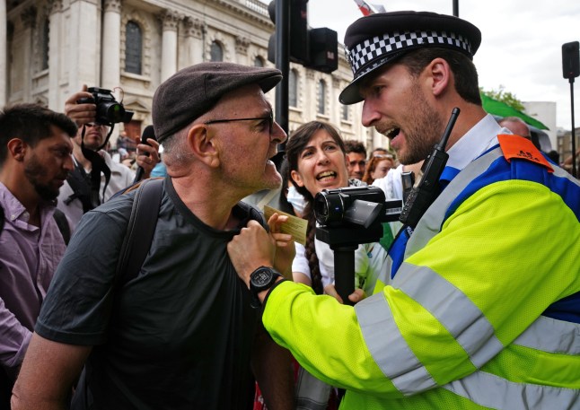 Police officers and protesters during a demonstration at Trafalgar Square in London to support Palestine Action. The Home Secretary is preparing to ban Palestine Action following the group's vandalism of two planes at an RAF base, making it a criminal offence to belong to or support Palestine Action. Picture date: Monday June 23, 2025. PA Photo. Photo credit should read: Jeff Moore/PA Wire