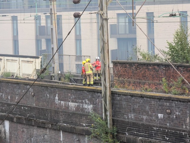 Plumes of smoke seen for MILES as fire ravages historic Manchester Hotspur Press building