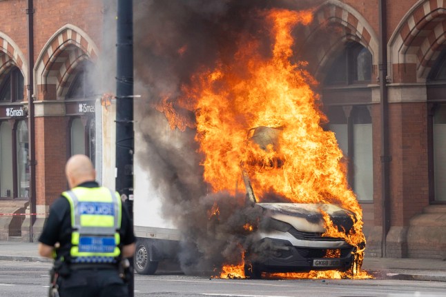 A van on fire outside St Pancras station