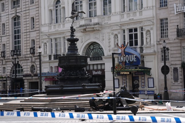 The scene after a car crashed near the Shaftesbury Memorial Fountain, popularly known as Eros in London's Piccadilly Circus. Emergency services were called to reports of a road traffic collision at around 5.30am on Sunday. One person was taken to a major trauma centre and the other to a local hospital. Picture date: Sunday June 29, 2025. PA Photo. Photo credit should read: Lucy North/PA Wire