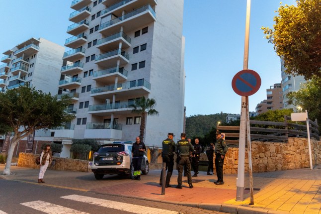 Spanish Civil Guard officers stand outside the garage where the body of the Russian pilot Maxim Kuzminov was found after he was shot dead, in Villajoyosa, Spain, February 13, 2024. Rafa Arjones/Informacion.es via REUTERS THIS IMAGE HAS BEEN SUPPLIED BY A THIRD PARTY. NO THIRD PARTY SALES. NOT FOR USE BY REUTERS THIRD PARTY DISTRIBUTORS