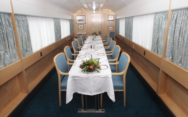 CARLISLE, ENGLAND - SEPTEMBER 06: The table is set in the dining room aboard the bio-fuel powered Royal Train arriving at Carlisle Station before leaving for Scotland to pick up Prince Charles, Prince of Wales on September 6, 2010 in Carlisle, England. Prince Charles embarked today on a five day tour of the UK to promote sustainable living. The Prince will be travelling on the Royal Train which is powered by bio fuel as he takes his tour to cities and towns from Glasgow to London. (Photo by Danny Lawson-WPA Pool/Getty Images)