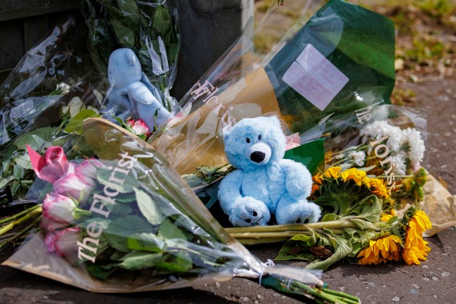 Floral tributes and teddy bears placed in Elmfield Walk area of Donaghadee, Co Down, after a murder investigation was launched after the body of pregnant mother-of-two Sarah Montgomery, 27, was found dead inside a house. A 28-year-old man has been arrested on suspicion of murder, and remains in police custody. Picture date: Monday June 30, 2025. PA Photo. Photo credit should read: Liam McBurney/PA Wire