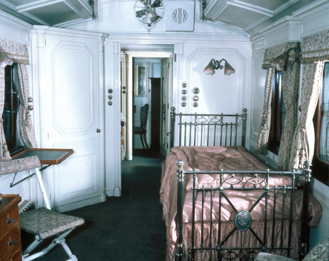 UNITED KINGDOM - SEPTEMBER 16: Interior of the Queen's bedroom in the London North Western Railway (LNWR) Royal train on display at the National Railway Museum in York, 1997. This room had previously been designed to accommodate Queen Alexandra and her daughter, Princess Louise. After Queen Mary began to use it, she had the tent over the bed removed and the room decorated. (Photo by SSPL/Getty Images)