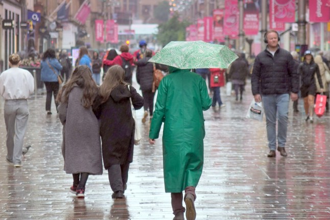 Alamy Live News. 3BNTXNR Glasgow, Scotland, UK. 4th July, 2025. UK Weather: Temperatures drop in true summer weather tradition as rain pours over the city soaking shoppers on the style mile and shopping capital of scotland, buchanan street. Credit Gerard Ferry/Alamy Live News This is an Alamy Live News image and may not be part of your current Alamy deal . If you are unsure, please contact our sales team to check.