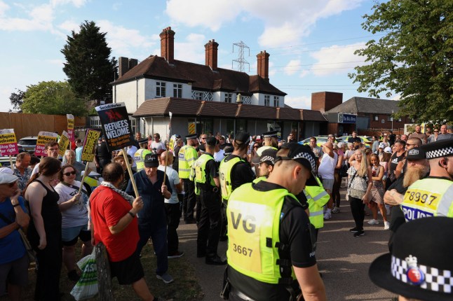 ? Licensed to London News Pictures. 13/07/2025. Epping, UK. Local residents are confronted by a counter protest as they gather to hold a protest outside The Bell hotel in Epping, Essex, England, against the hotel?s housing of migrants. Protesters and parts of the local community are raising concerns about an alleged sexual assault carried out by a migrant in Epping last week. Photo credit: Jacqueline Lawrie/LNP